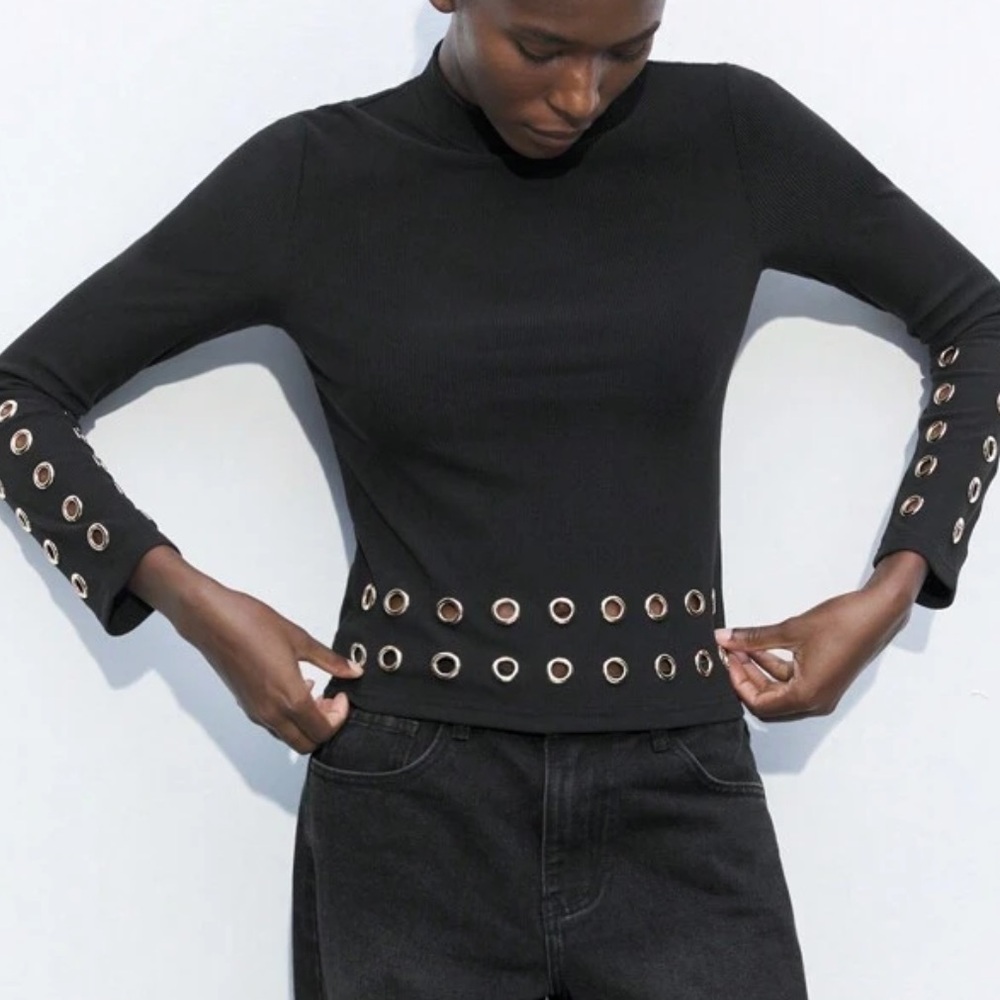 Black along sleeve with embellishments